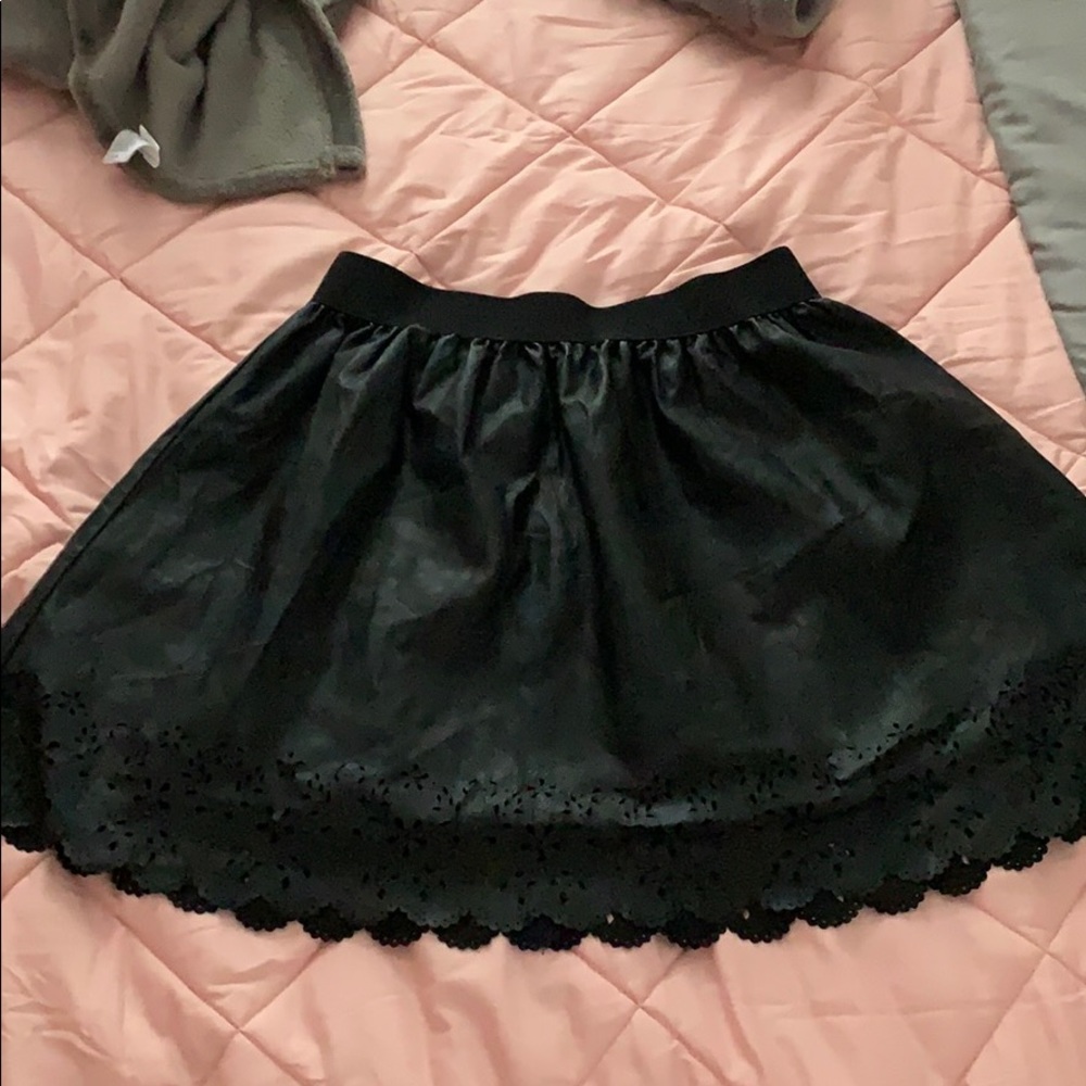 Black loose leather like skirt